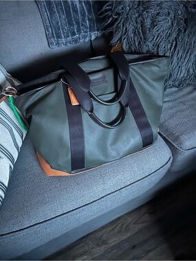 Coach Olive Green Duffel Bag with Black Straps and Tan Accents